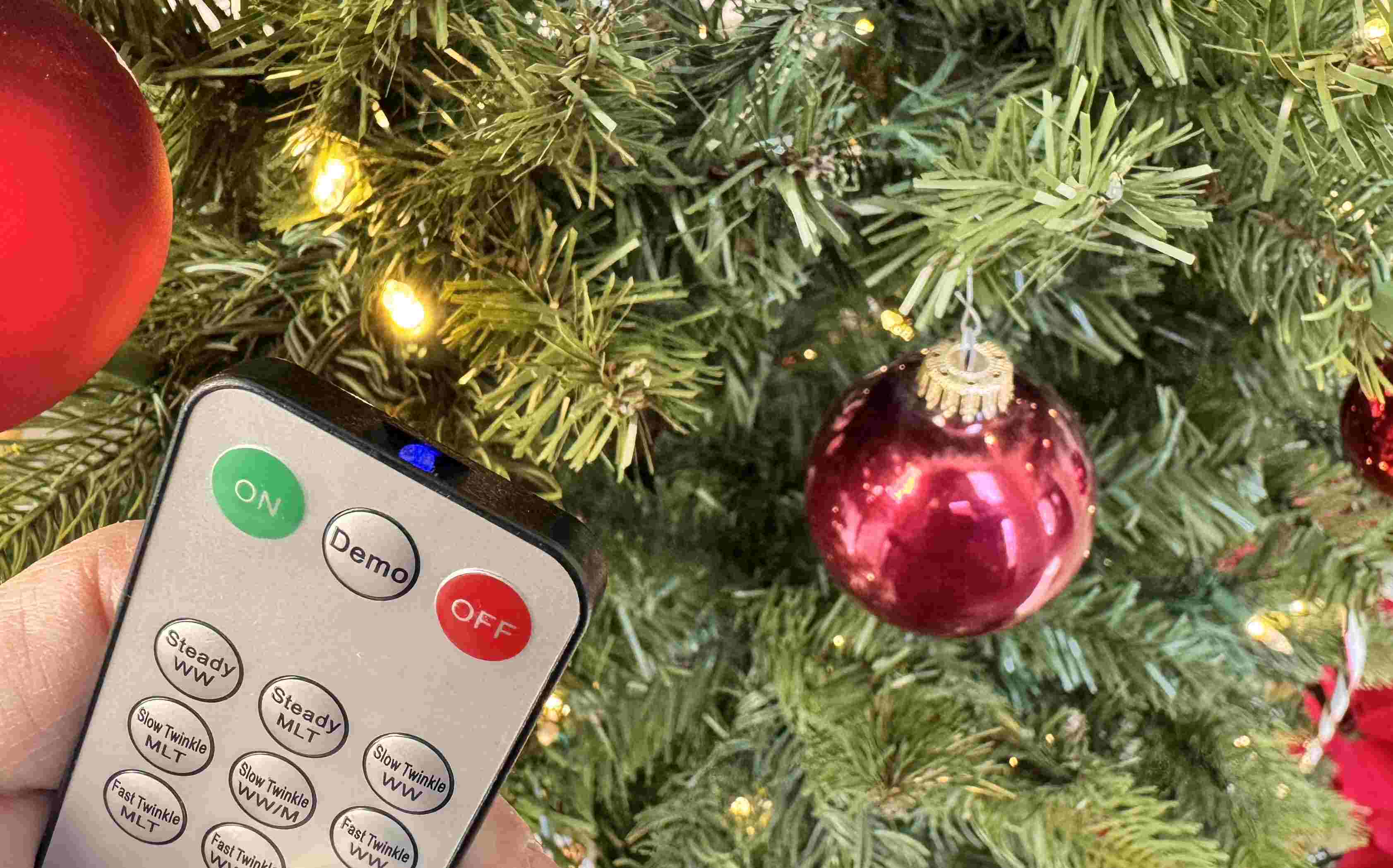 remote pointing at tree